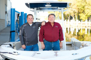 Rob Kotowski, owner and president of Lake Shore Boat Top Co., with his father and mentor Bob Kotowski.